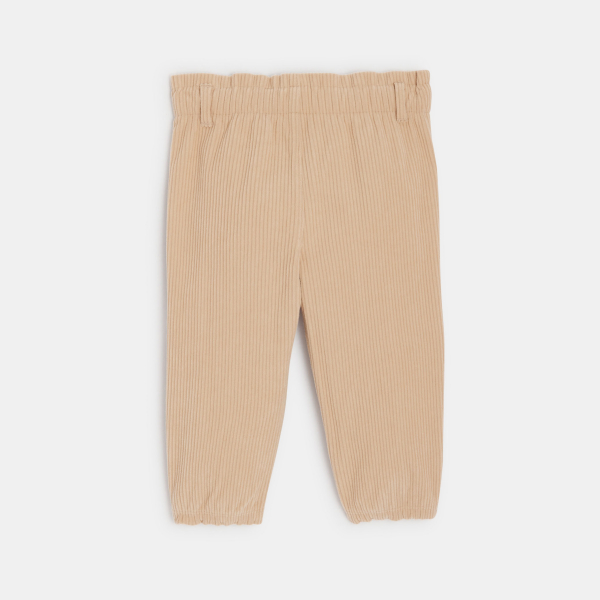 بنطلون من الثوب المخملي المضلع، بمقاس مرن وبلون الوردي البيج للفتيات الصغيرات. بنطلون من الثوب المخملي المضلع، بمقاس مرن وبلون الوردي البيج للفتيات الصغيرات.