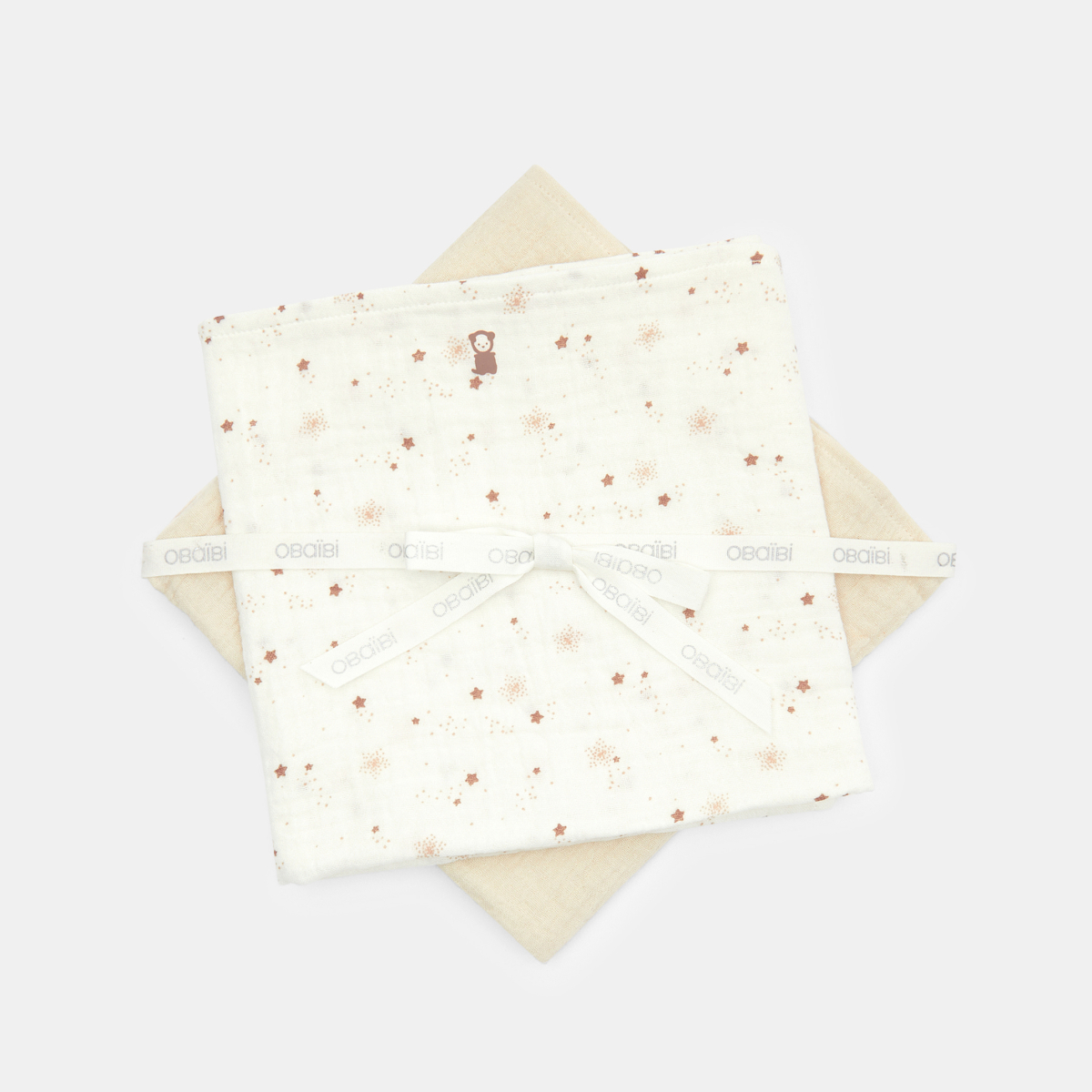 قماط شاش قطني باللون البيج للأطفال الُرضع من الجنسين (طقم من قطعتين) قماط شاش قطني باللون البيج للأطفال الُرضع من الجنسين (طقم من قطعتين)