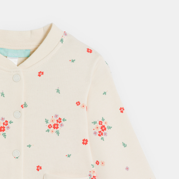 جاكيت من طراز تيدي من الميلتون برسوم الأزهار،  باللون البيج للفتيات الصغيرات جاكيت من طراز تيدي من الميلتون برسوم الأزهار،  باللون البيج للفتيات الصغيرات