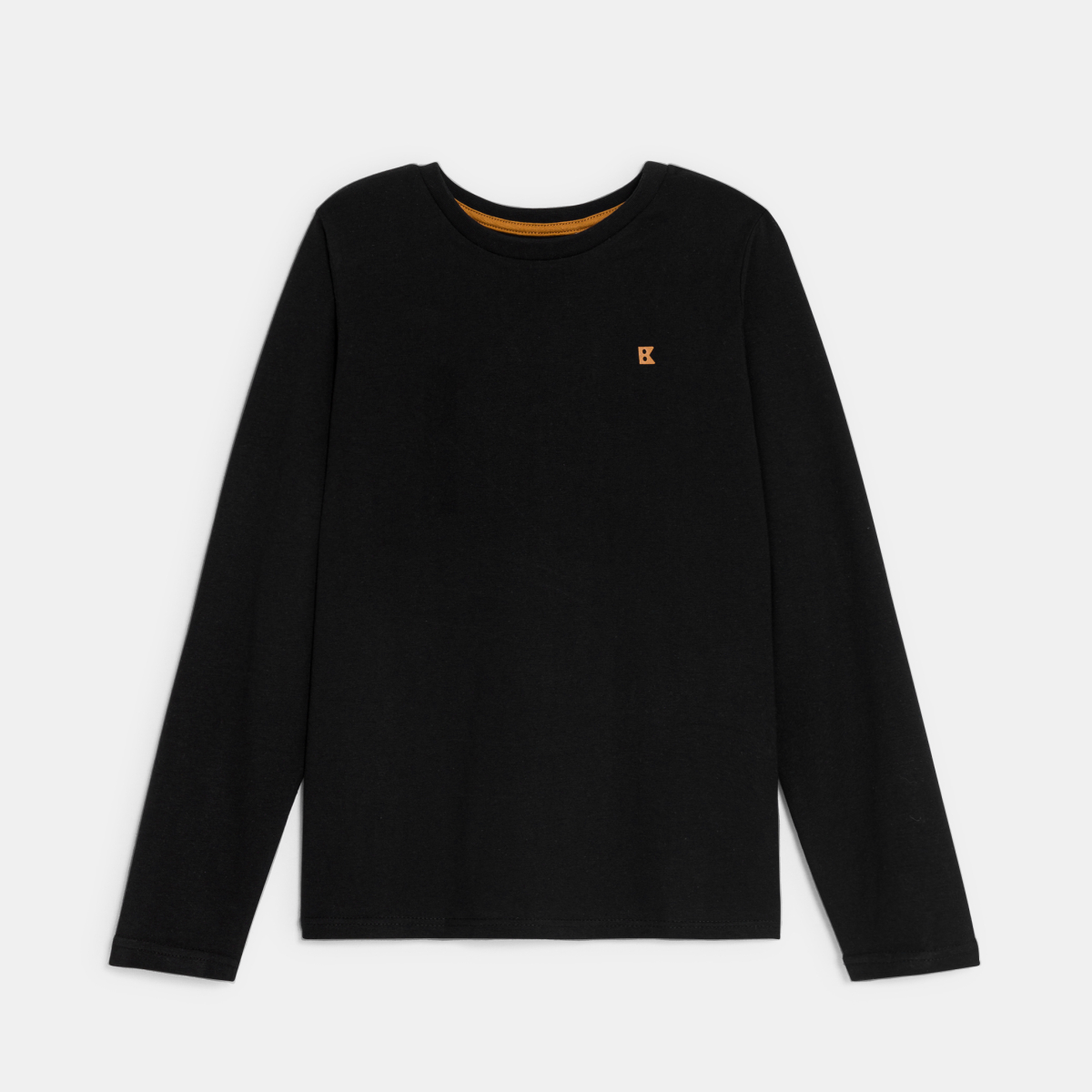 تيشيرت موحد بأكمام طويلة، باللون الأسود للأطفال الصغار. تيشيرت موحد بأكمام طويلة، باللون الأسود للأطفال الصغار.