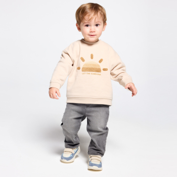 سترة من الصوف الناعم برسمة للشمس، باللون البيج للأطفال الصغار