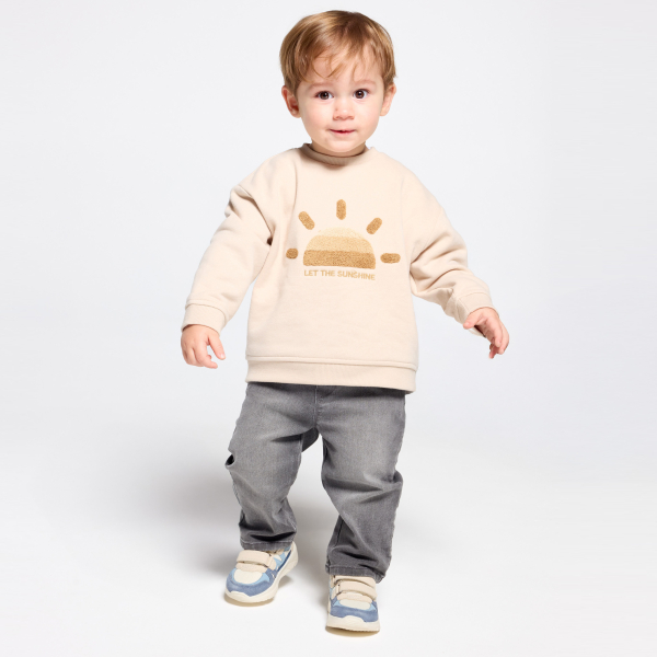 سترة من الصوف الناعم برسمة للشمس، باللون البيج للأطفال الصغار سترة من الصوف الناعم برسمة للشمس، باللون البيج للأطفال الصغار