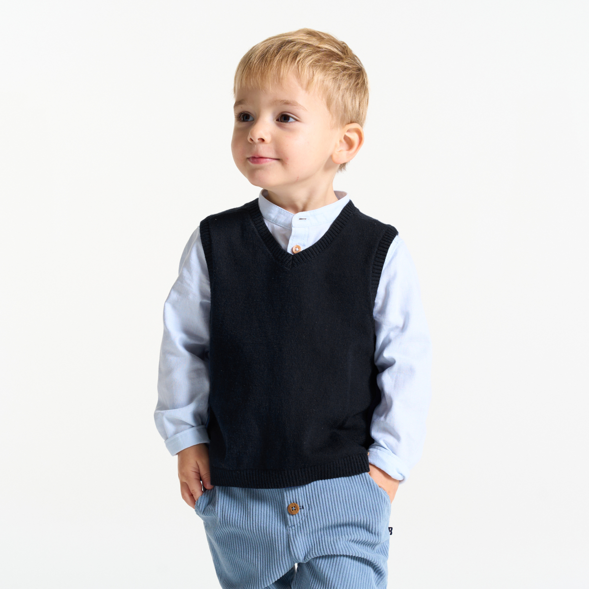 كنزة تريكو محبوكة بدون أكمام باللون الأزرق للأولاد الصغار كنزة تريكو محبوكة بدون أكمام باللون الأزرق للأولاد الصغار