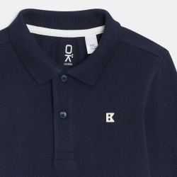 قميص بولو أزرق اللون بأكمام...