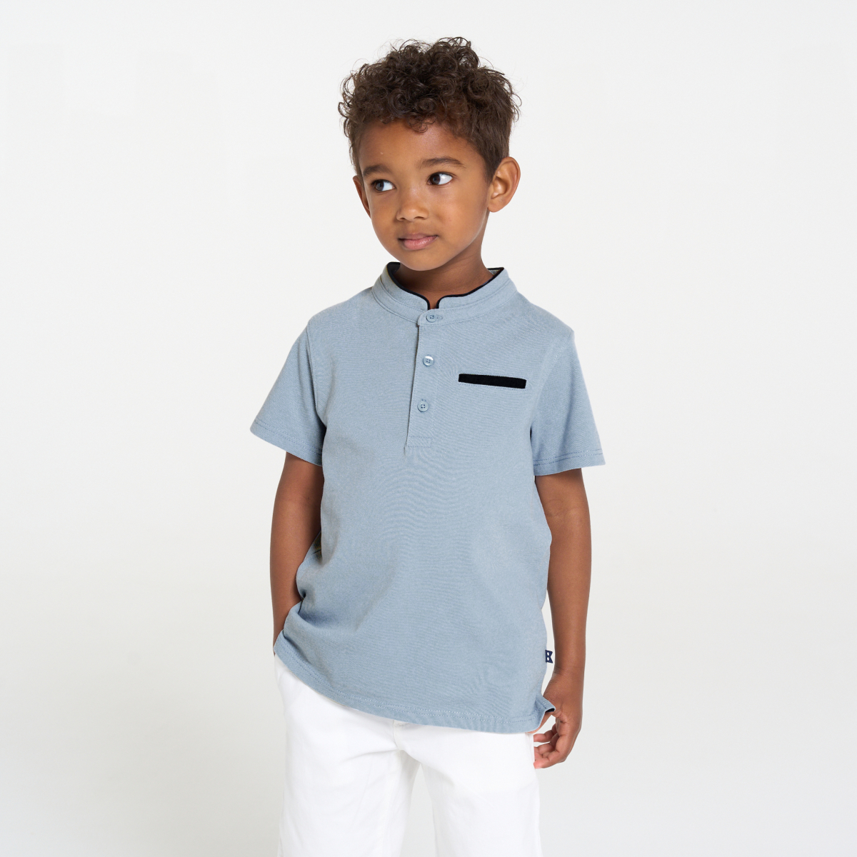 قميص بولو أزرق فاتح بأكمام قصيرة للأولاد قميص بولو أزرق فاتح بأكمام قصيرة للأولاد