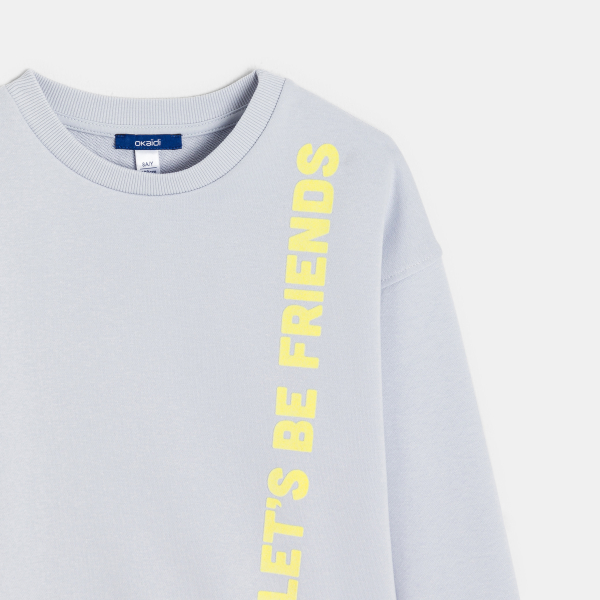 تيشيرت مع عبارة باللون الرمادي للأولاد. تيشيرت مع عبارة باللون الرمادي للأولاد.