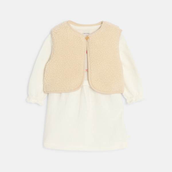 فستان محبوك بطريقة التريكو ومزين برسمة فأر، وسترة بيضاء للفتيات الصغيرات