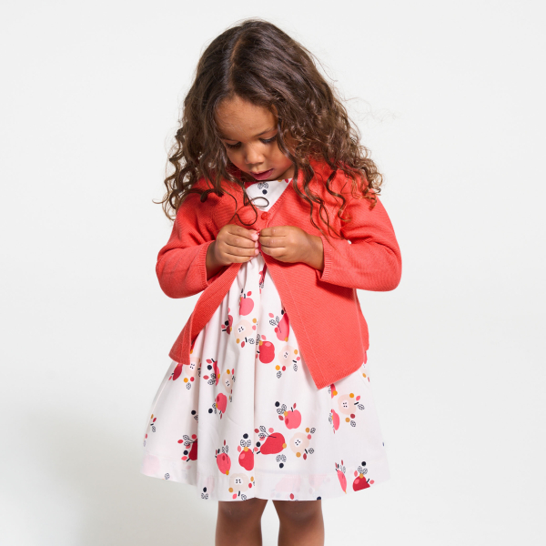 سترة تريكو وردية بطية للطفلة الصغيرة سترة تريكو وردية بطية للطفلة الصغيرة