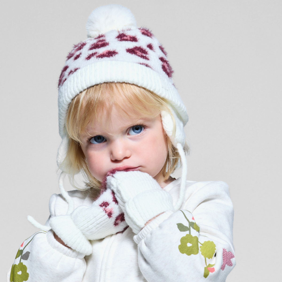 قفازات بلا أصابع محبوكة مع رسوم لجلد الفهد باللون الوردي للطفلة الرضيعة قفازات بلا أصابع محبوكة مع رسوم لجلد الفهد باللون الوردي للطفلة الرضيعة